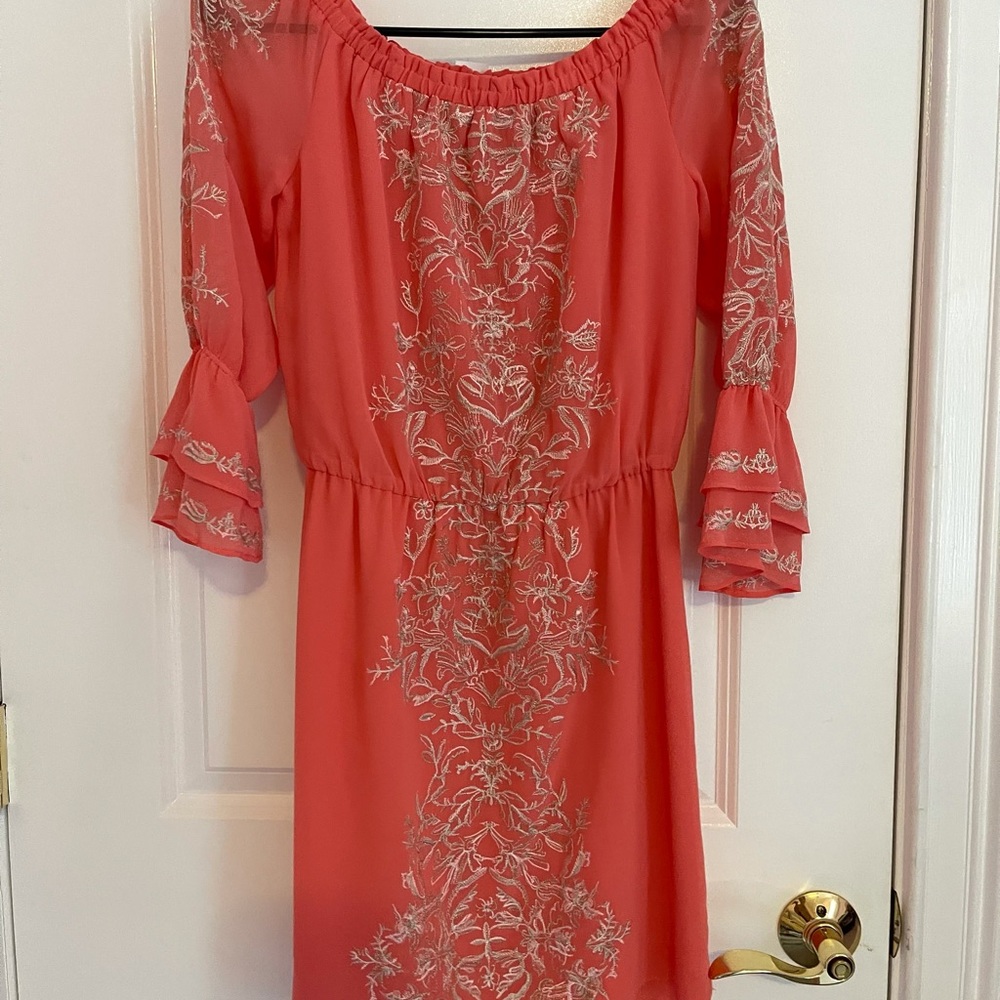 tangerine color. 3/4 sleeve length. Dress.
